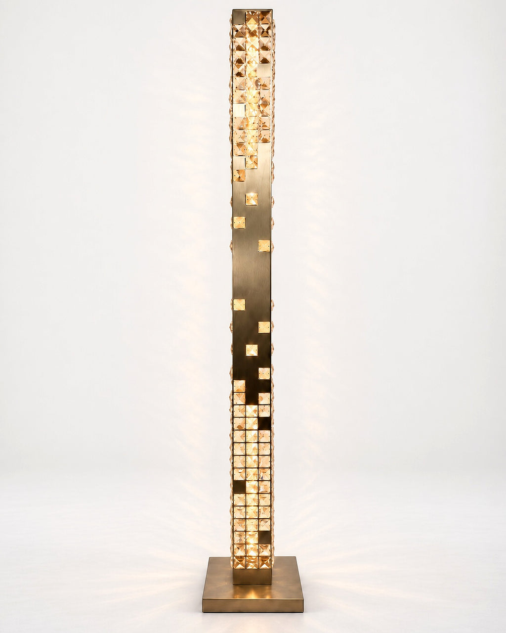 Cascade Crystal Tower Floor Lamp in Champagne Gold, illuminated front view